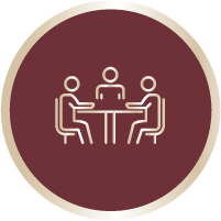 Icono de 3 personas en una mesa